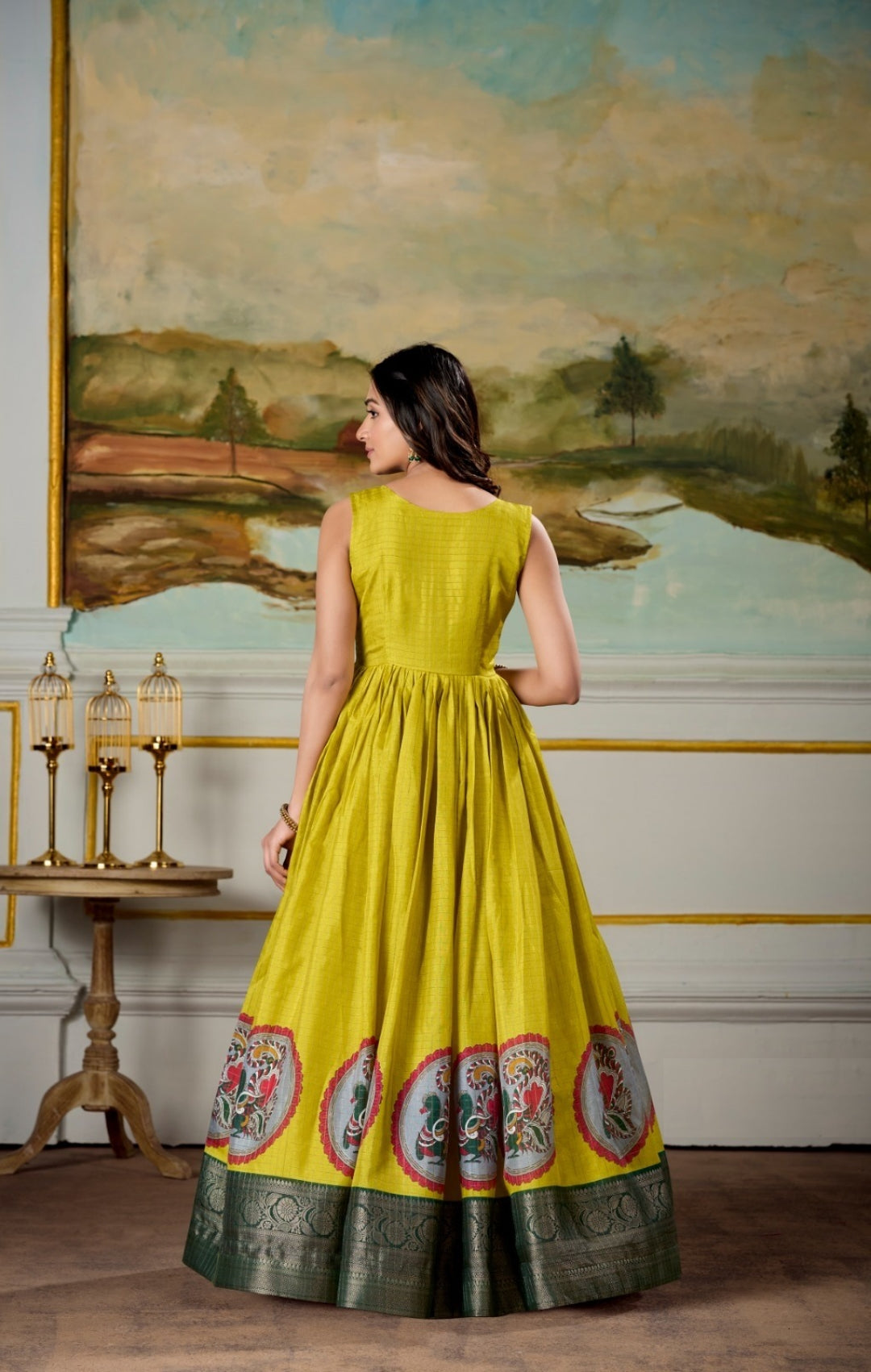 Women Yellow And Green Dola Silk Kalamkari Print With Zari Weaving Broder Floor-Length Gown