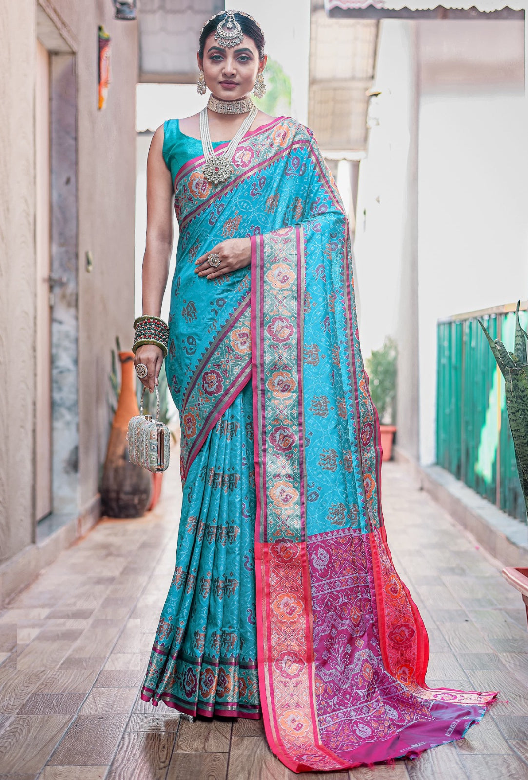 Women Teal Patola Silk Saree