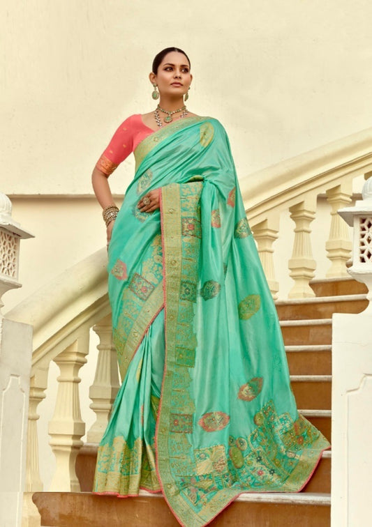 Breathtaking Sea Green And Coral Silk Banarasi Silk Saree