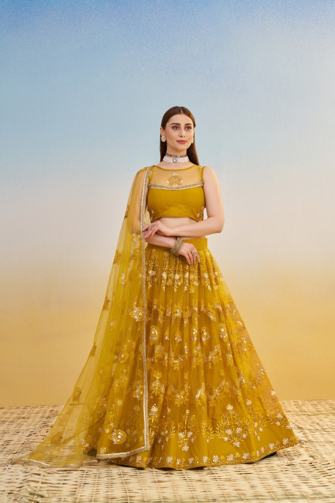 Breathtaking Mutard Net With Two Tone Coding Thread Sequin Embroidery Work Stylish Lehenga Set