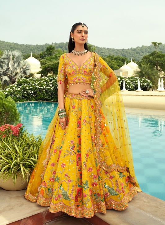 Exquisit Yellow Silk With Embroidery Work Bridal Lehenga