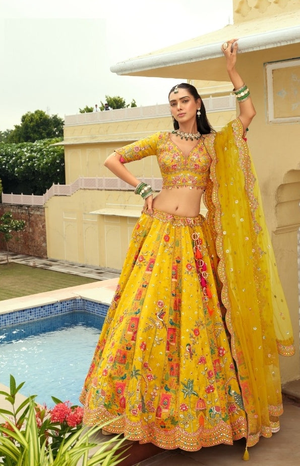Exquisit Yellow Silk With Embroidery Work Bridal Lehenga