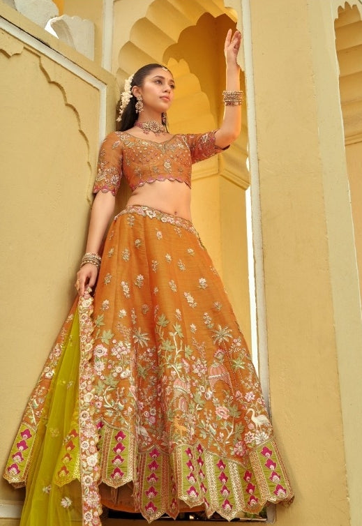 Captivating Orange Silk With Embroidery Work Bridal Lehenga