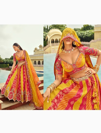 Magnificent Yellow And Pink Silk With Embroidery Work Bridal Lehenga