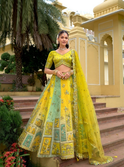 Exquisite Yellow And Blue Silk With Embroidery Work Bridal Lehenga