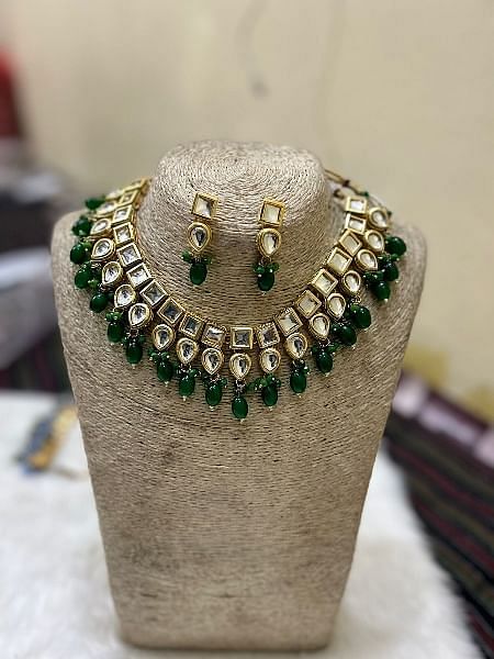 Elegant Green and Gold Kundan Necklace Set with Earrings
