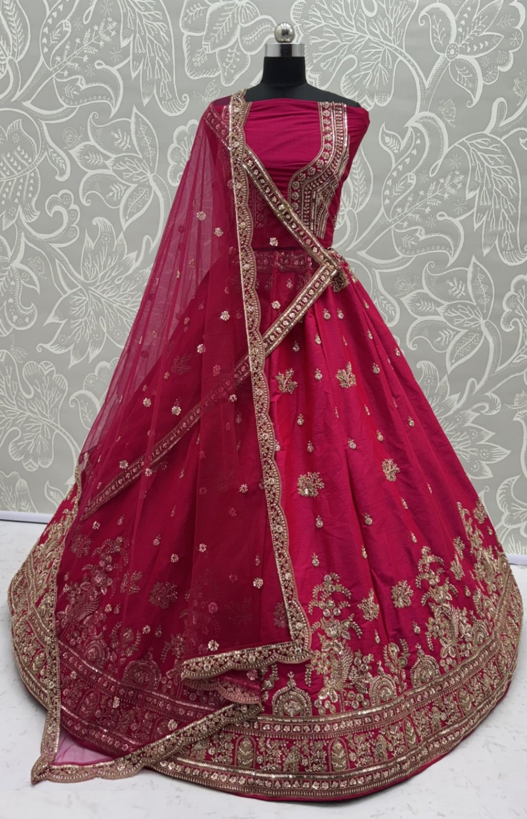 Vivid Dark Pink Gadhwal Silk Thread Embroidery Sequins Work Lehengas With Double Dupatta