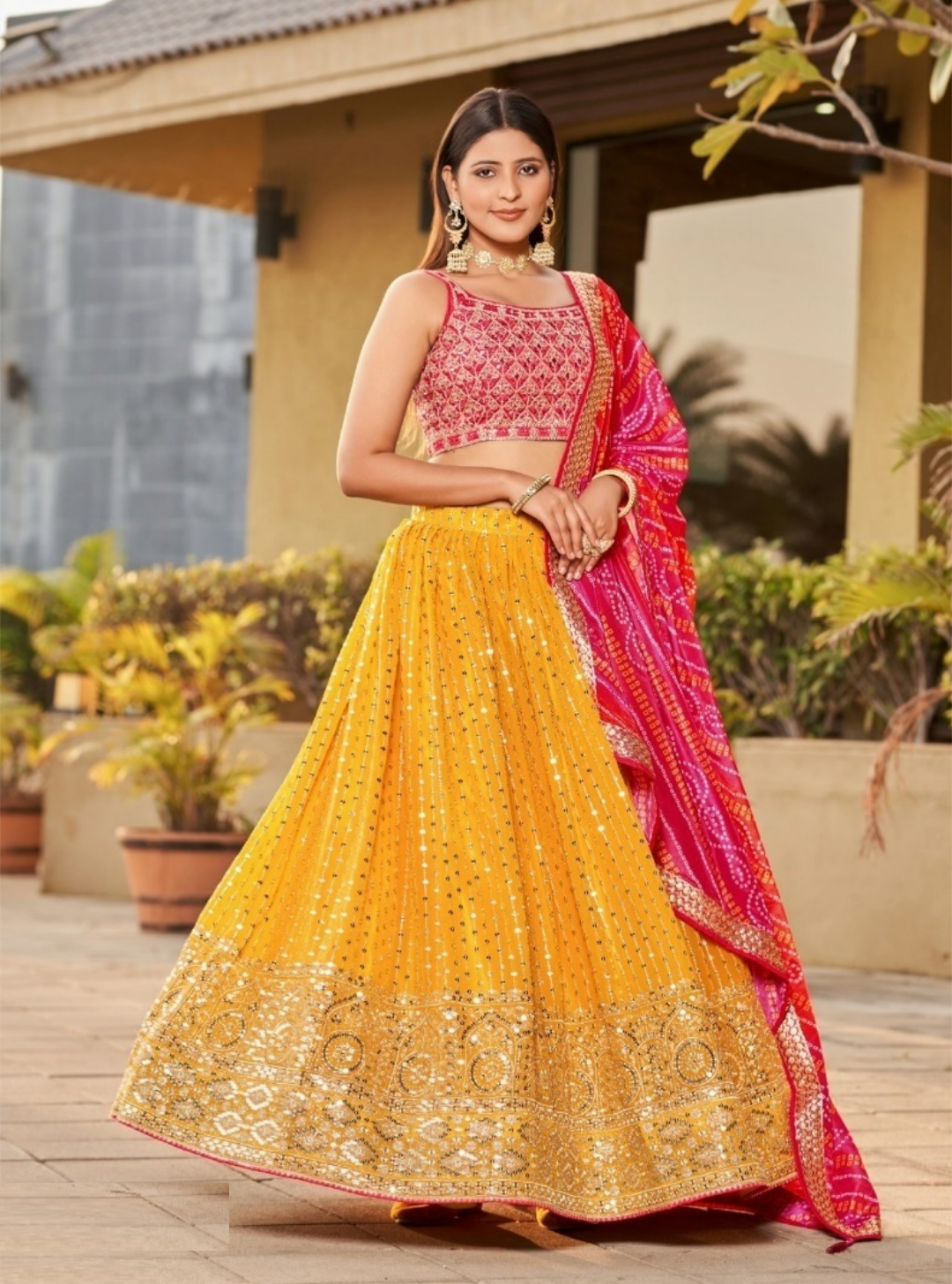 Dazzling Mustard And Pink Art Silk Glittering Shining Lehengas