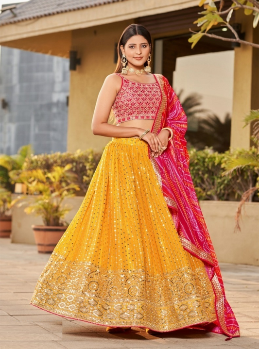Dazzling Mustard And Pink Art Silk Glittering Shining Lehengas