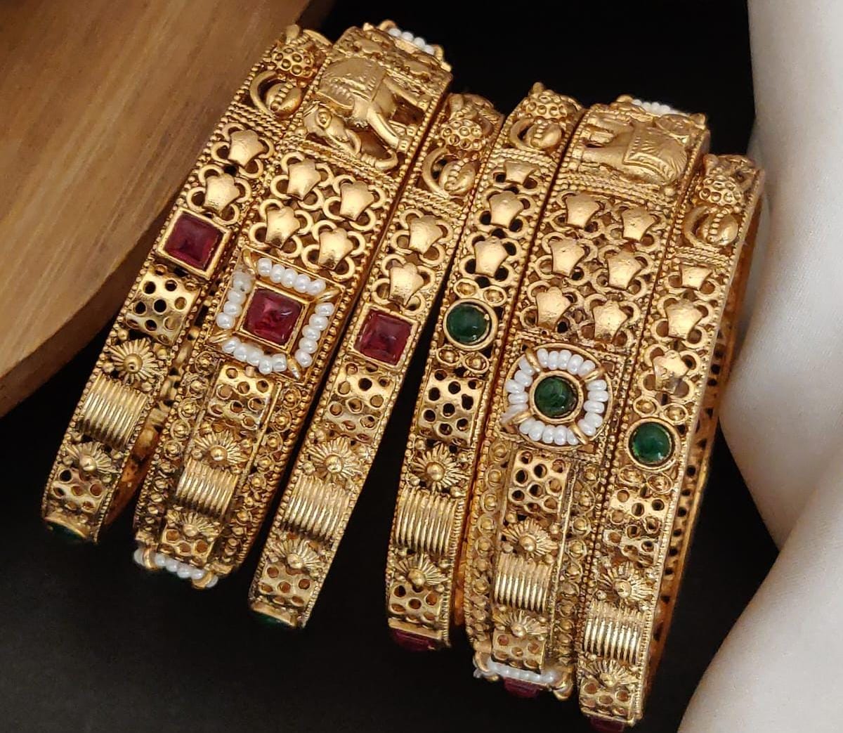Eyes Blings Gold Plated Brass Bangle Set Featuring Intricate Featuring And Studded Stones