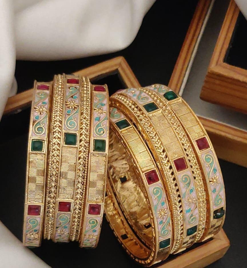 Golden Grace Gold Plated Brass Bangle Set Featuring Intricate Featuring And Studded Stones