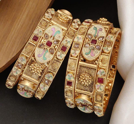 Jewelz Gold Plated Brass Bangle Set Featuring Intricate Featuring And Studded Stones