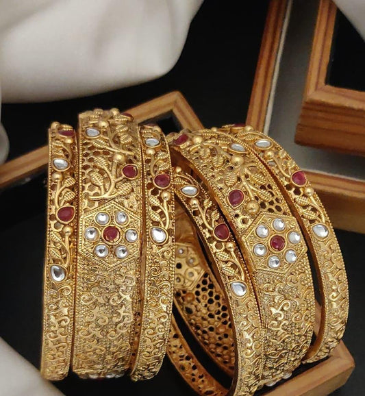 Pearl Circles Gold Plated Brass Bangle Set Featuring Intricate Featuring And Studded Stones