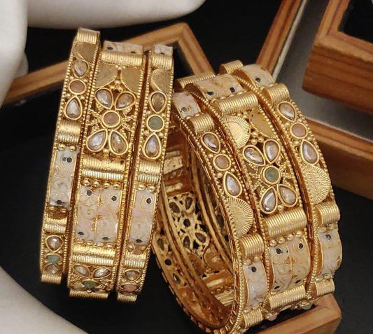 Classic Gold Plated Brass Bangle Set Featuring Intricate Featuring And Studded Stones