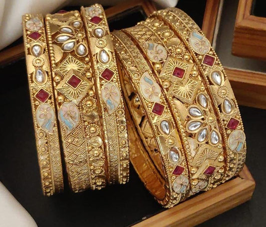 Glisten Cart Gold Plated Brass Bangle Set Featuring Intricate Featuring And Studded Stones