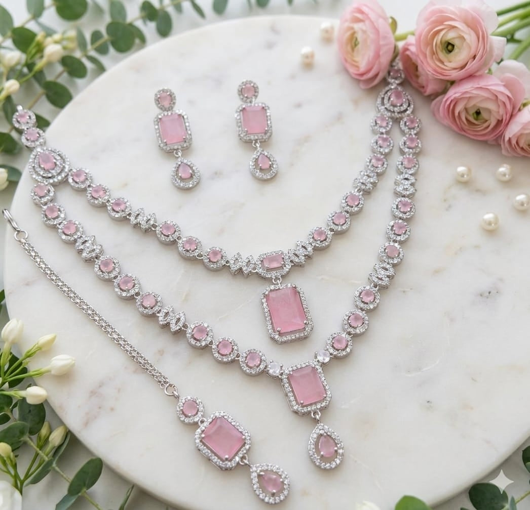 Silver Plated American Diamond Studded Jewelry Set Featuring Light Pink Stones And Matching Earrings