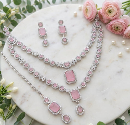 Silver Plated American Diamond Studded Jewelry Set Featuring Light Pink Stones And Matching Earrings