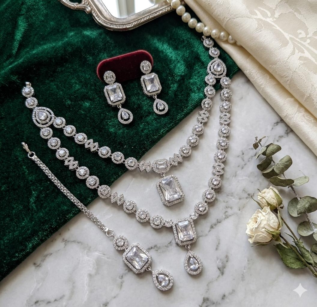 Silver Plated American Diamond Studded Jewelry Set Featuring White Stones And Matching Earrings
