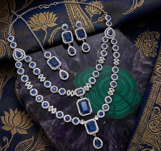Silver Plated American Diamond Studded Jewelry Set Featuring Blue Stones And Matching Earrings