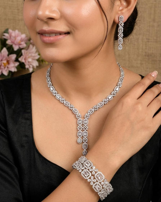 Rubans Rhodium Plated Stone Studded White Necklace And Earrings Set With Bangle