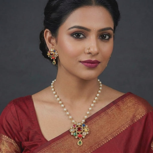 Gold Plated Navratan Jewellery Set Featuring Kundan Studded Floral Motifs