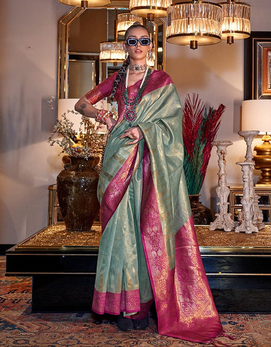 Stylish Sea Blue And Purple Handwoven Zari Tissue Silk Saree