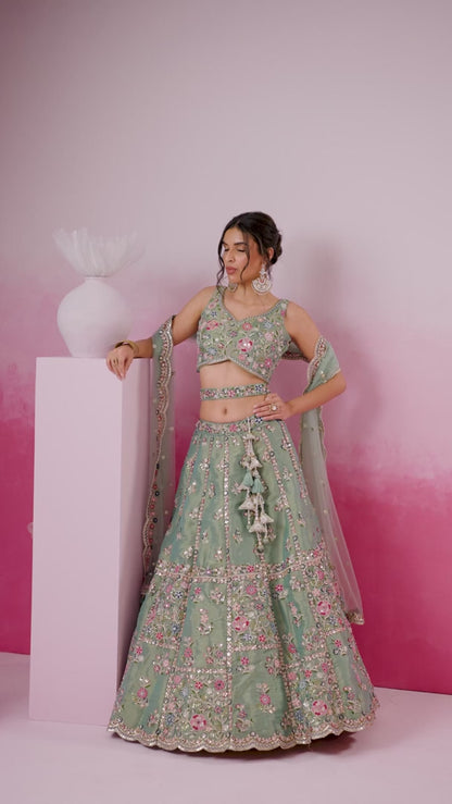 Stylish Sea Green Net With Embroidery Work Bridal Lehenga